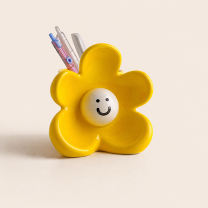 Sunny flower-inspired ceramic desk organizer with pens