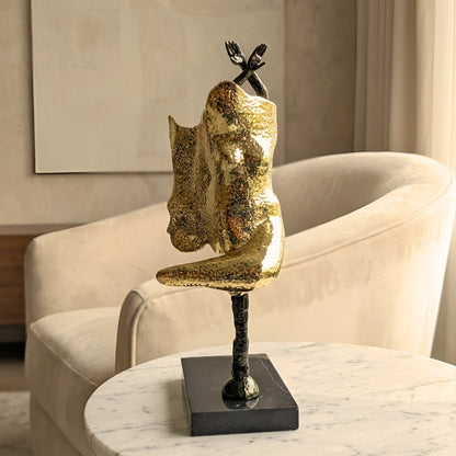 Sway sculptural lady figurine styled on a side table