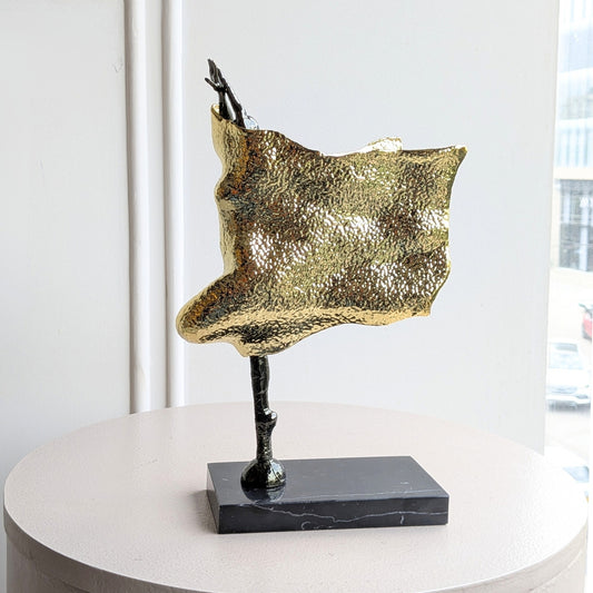 Sway gold-toned metal and marble lady figurine front view