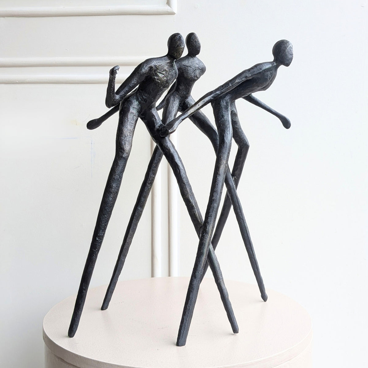 Sculptural metal human figurine showpiece with textured artisanal finish