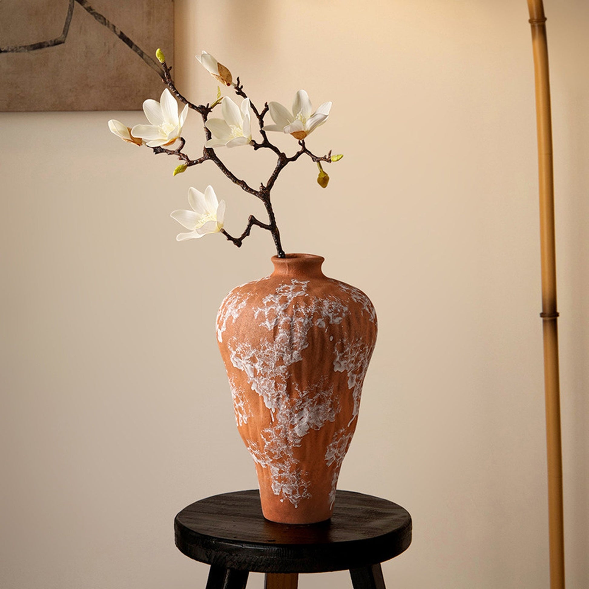 Terra Veil textured ceramic vase displayed on a pedestal