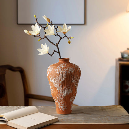 Terra Veil sculptural ceramic vase in a warm interior setting