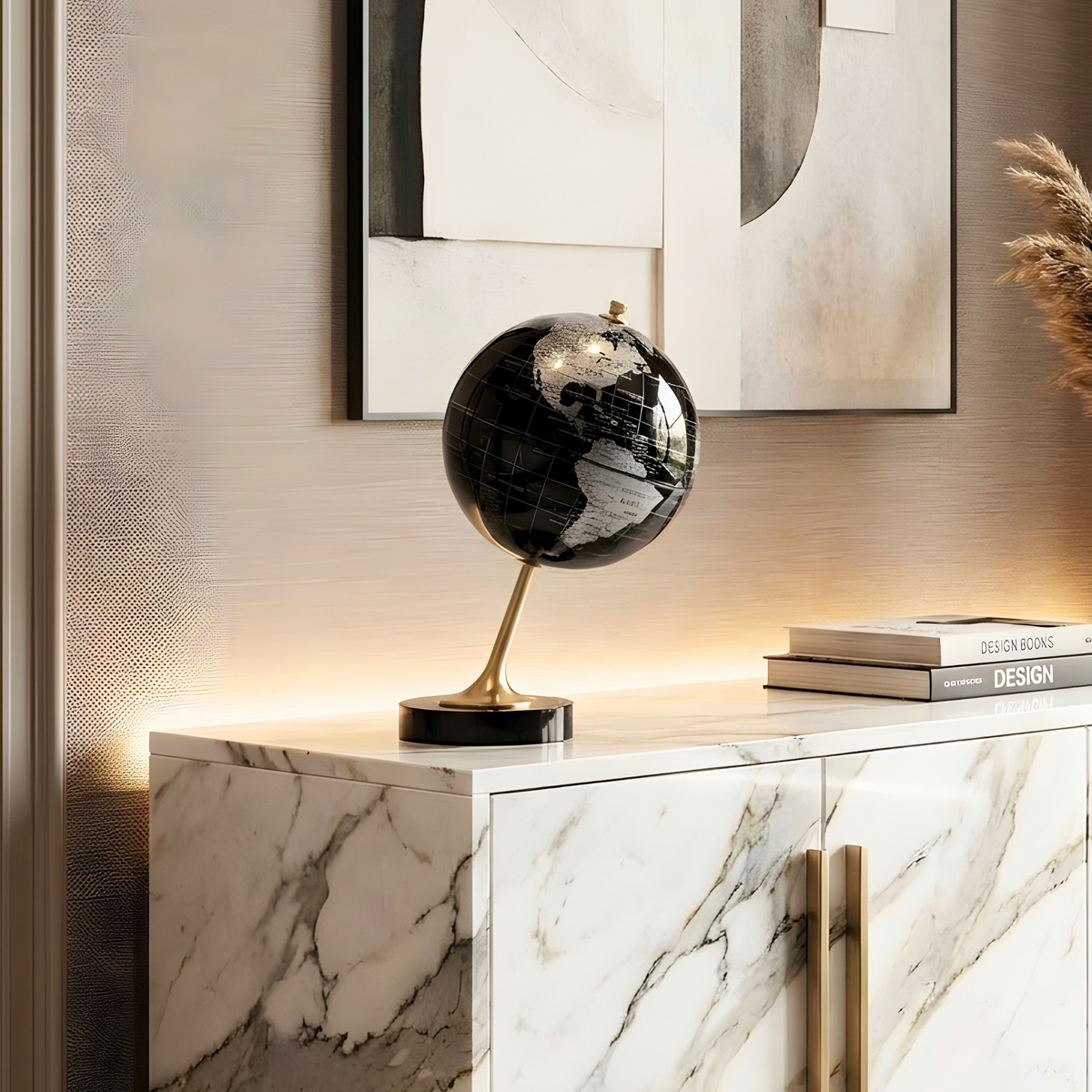 The World black and gold globe showpiece styled on a marble console