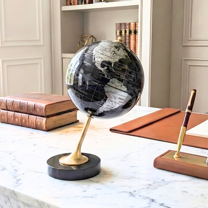 The World metal globe showpiece styled on a study desk