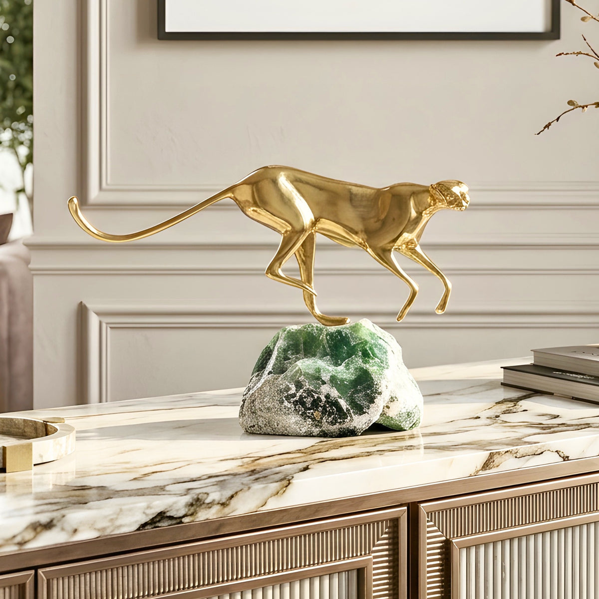 Velocity brass wildlife sculpture on green natural stone for luxury living room and console styling, view 4