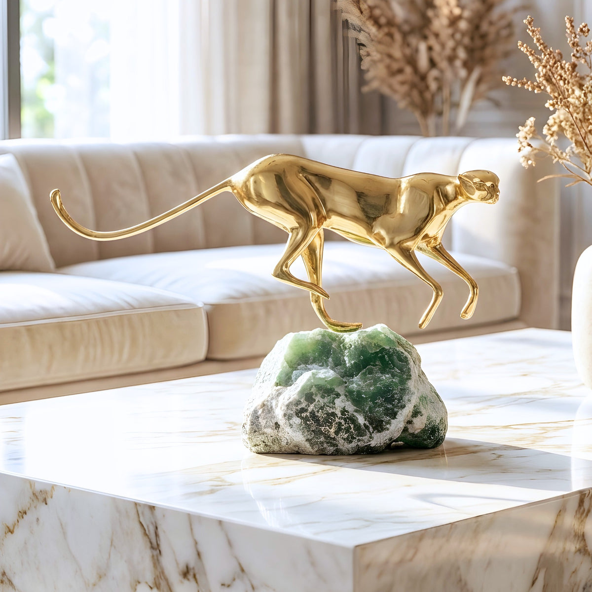 Velocity brass wildlife sculpture on green natural stone for luxury living room and console styling, view 5
