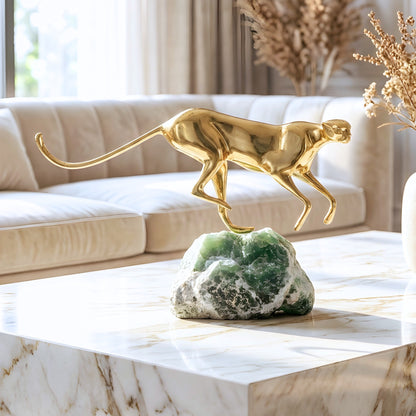Velocity brass wildlife sculpture on green natural stone for luxury living room and console styling, view 5