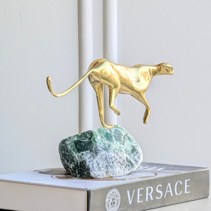 Velocity brass wildlife sculpture on green natural stone for luxury living room and console styling, view 6