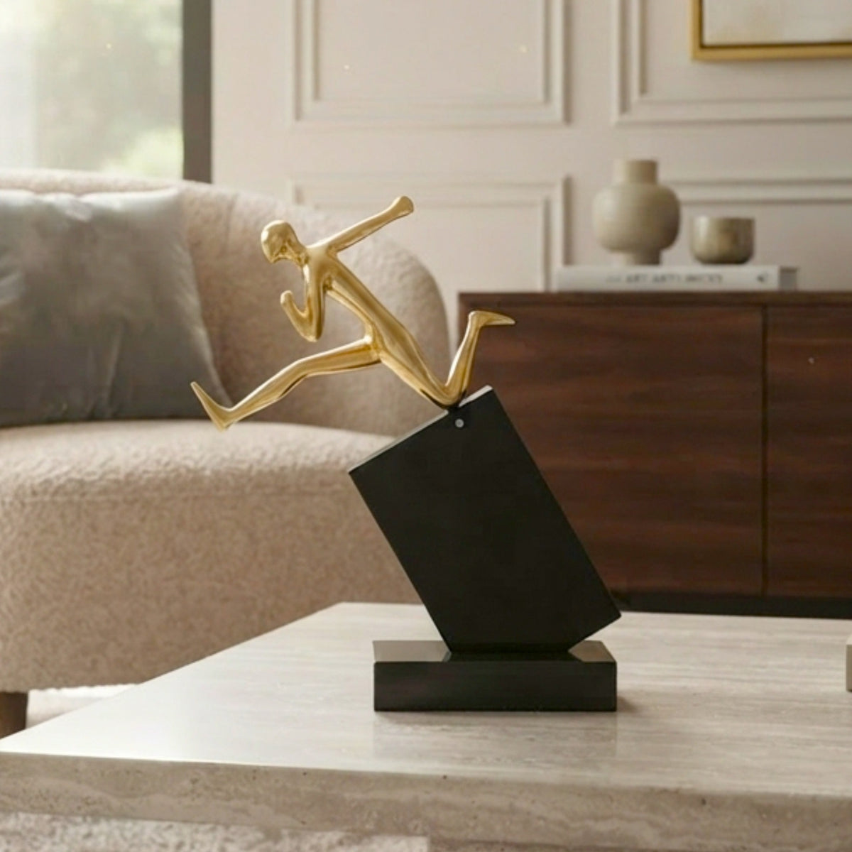Velocity Running metal figurine on a black marble base